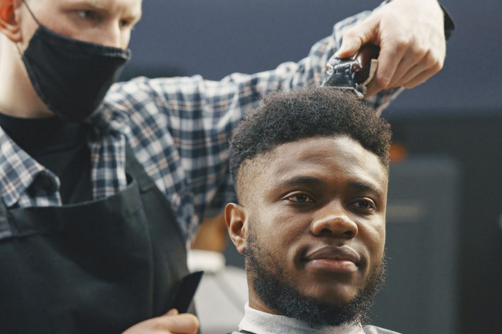 man getting a haircut